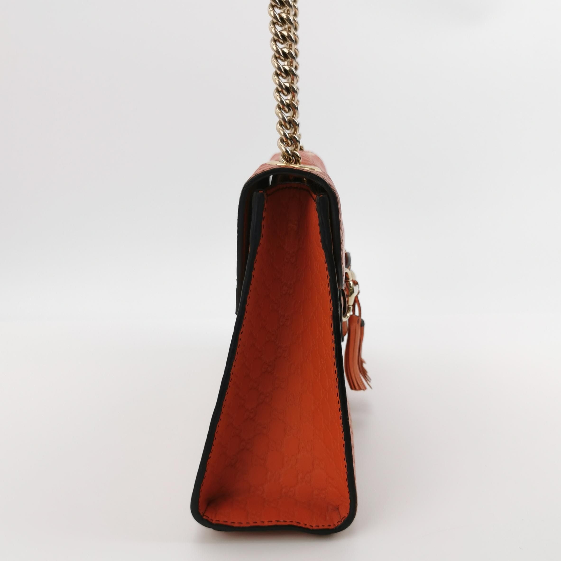 Gucci Emily Medium Leather Shoulder Bag with Signature Embossing and Tassel Horsebit Detail 250316781107553