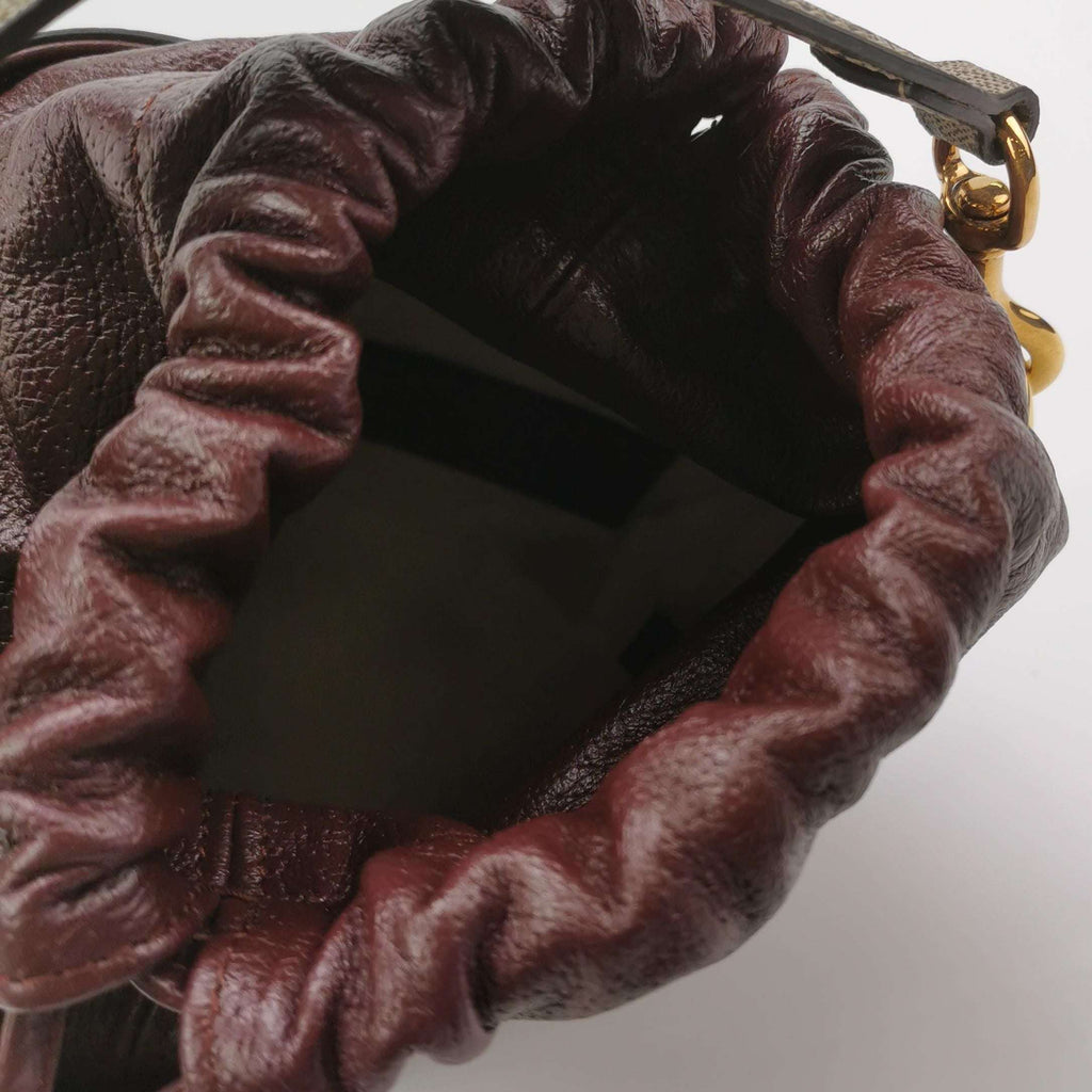 Gucci Quilted GG Logo Drawstring Crossbody Bag 047852700582