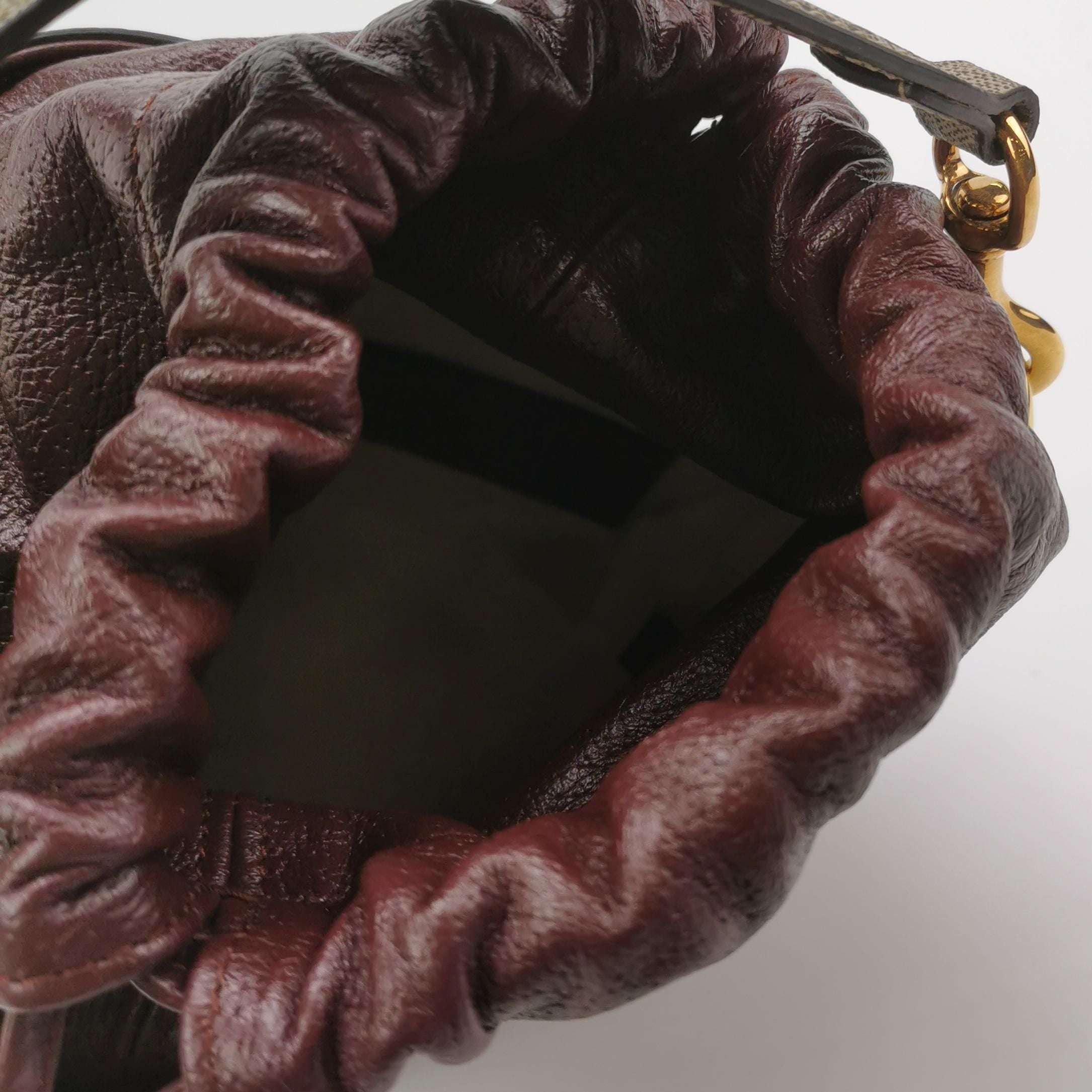 Gucci Quilted GG Logo Drawstring Crossbody Bag 047852700582