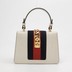 Gucci Sylvie Mini Leather Crossbody Bag with Metal Buckle and Webbing Strap 250513781190148