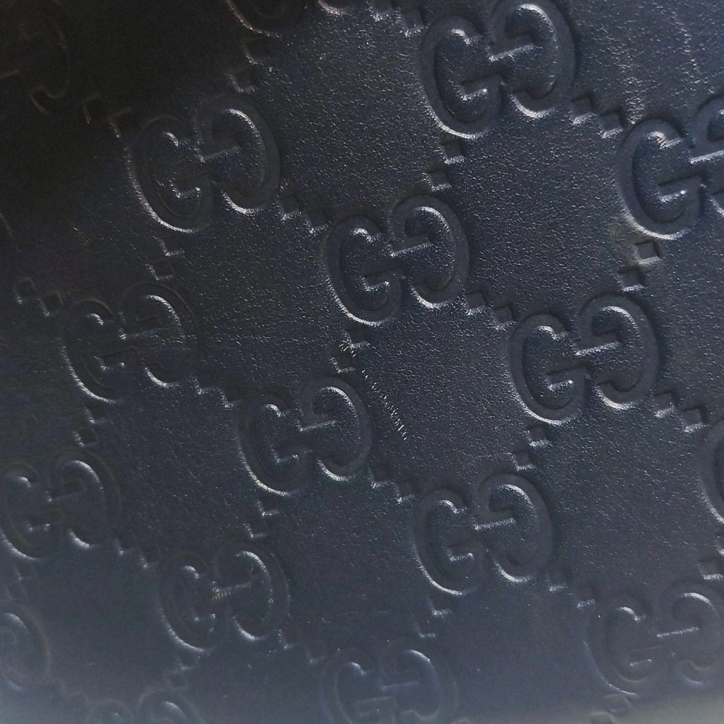 Gucci GG Embossed Shoulder Bag 037820803305