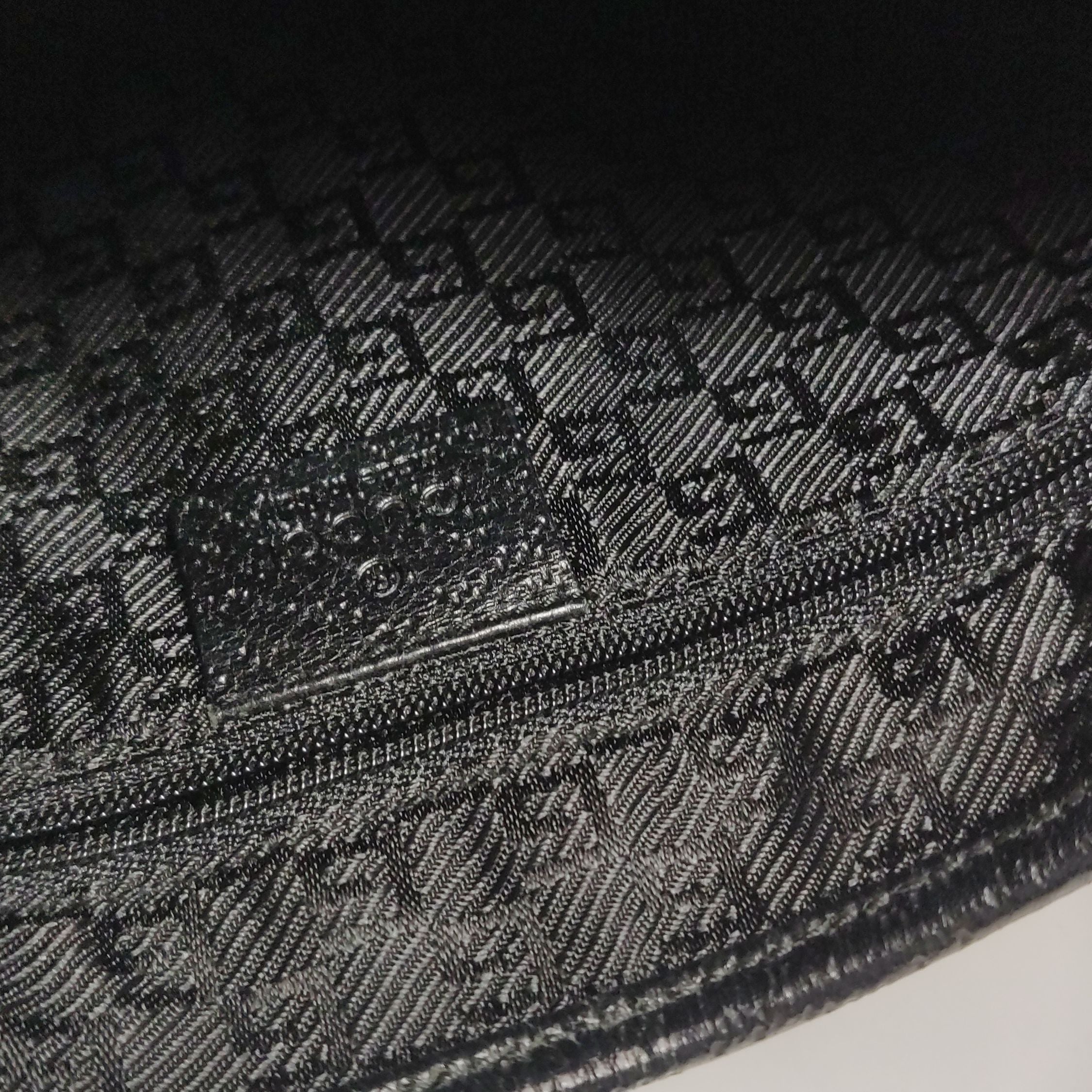 Gucci Jackie Leather and Canvas Shoulder Bag with Bamboo Handle and Metal Buckle 24111078938760