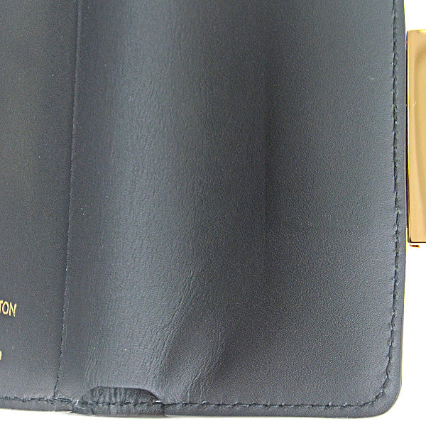 Louis Vuitton Monogram Reverse Compact Wallet M68725