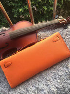 Hermes Orange Handcrafted Kelly Cut Clutch