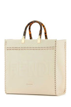 FENDI SUNSHINE MEDIUM TOTE BAG, RAFFIA & TAN LEATHER.