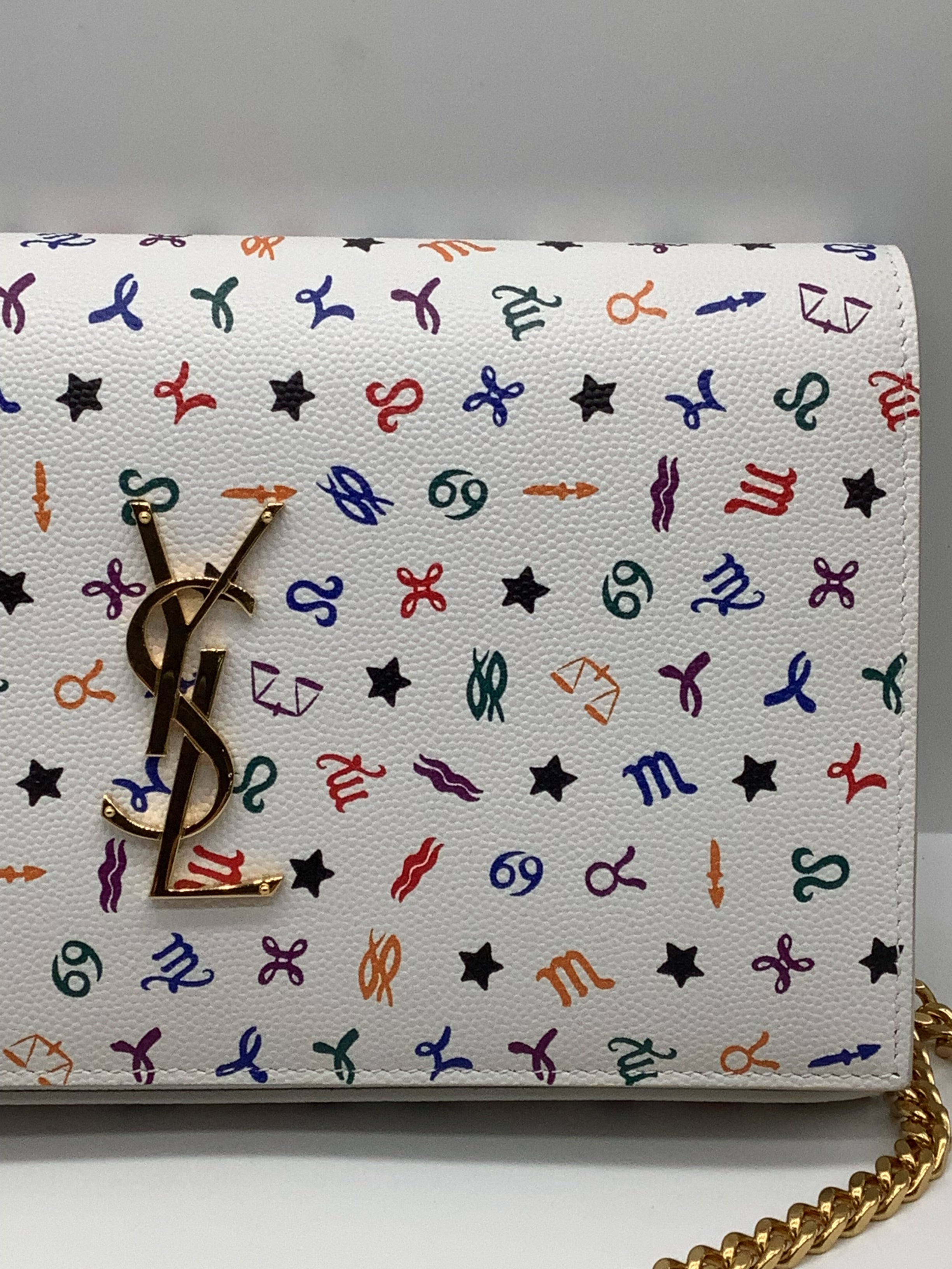 Yves Saint Laurent Zodiac Print White Clutch