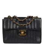 Vintage Chanel Jumbo Classic Mademoiselle Vertical Flap Black Caviar Gold Hardware