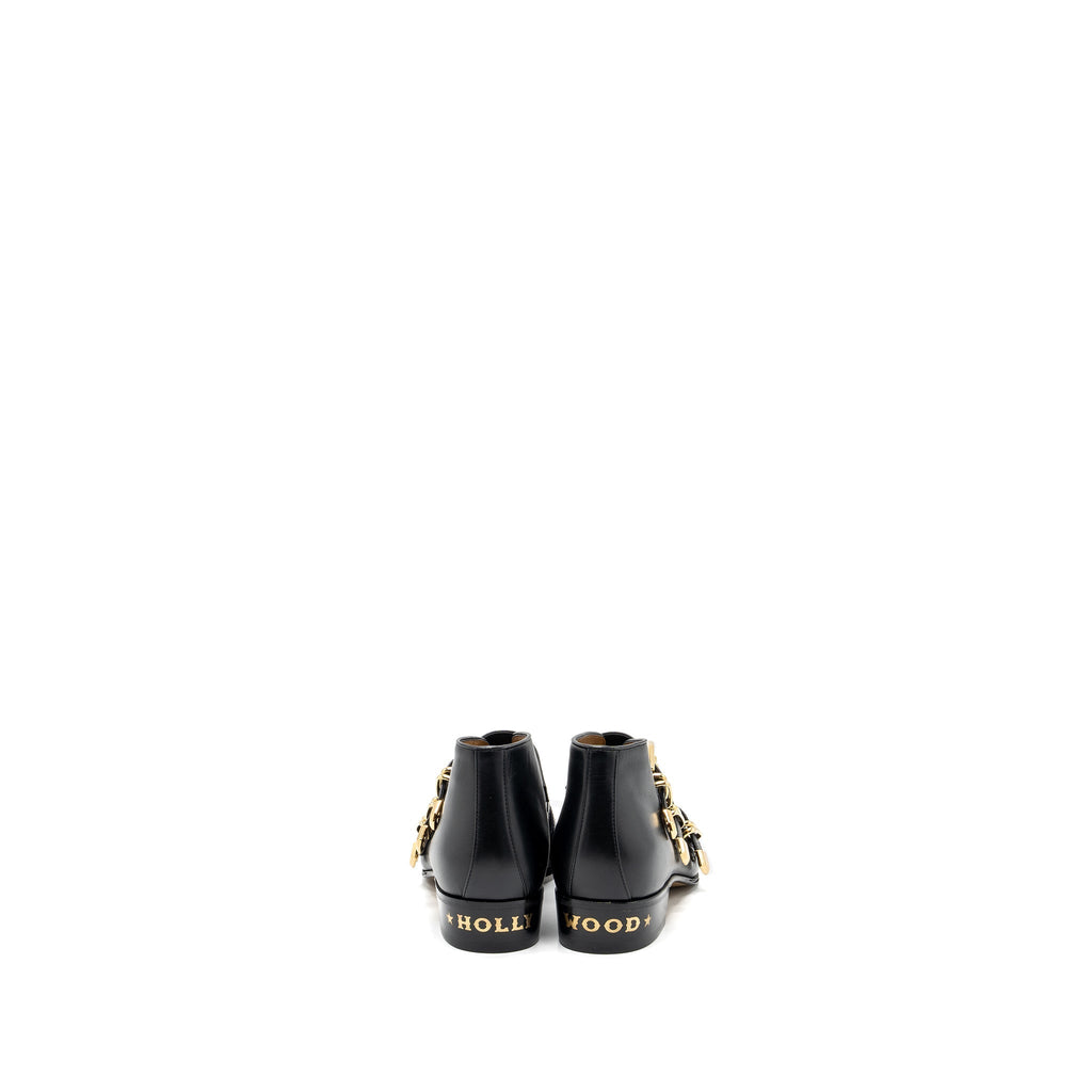 Gucci size 38 triple buckle ankle boots black GHW