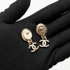 Chanel CC drop earrings light gold tone