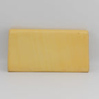 Yves Saint Laurent yellow leather clutch TWS pop