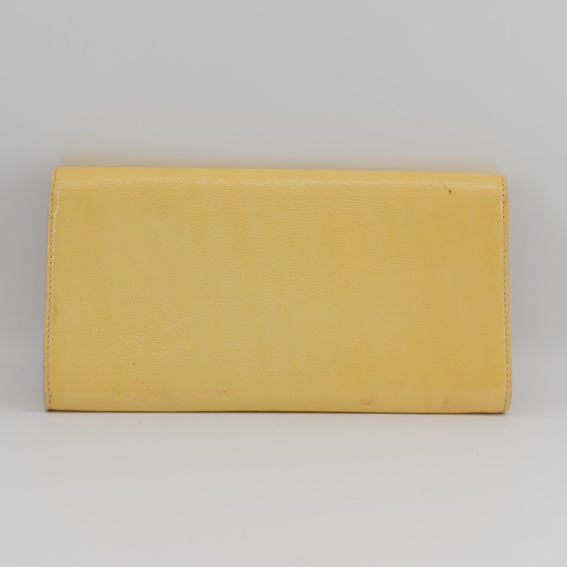 Yves Saint Laurent yellow leather clutch TWS pop