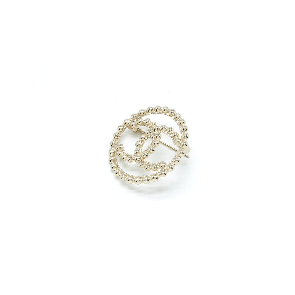 Chanel Round with CC logo light gold tone Brooch