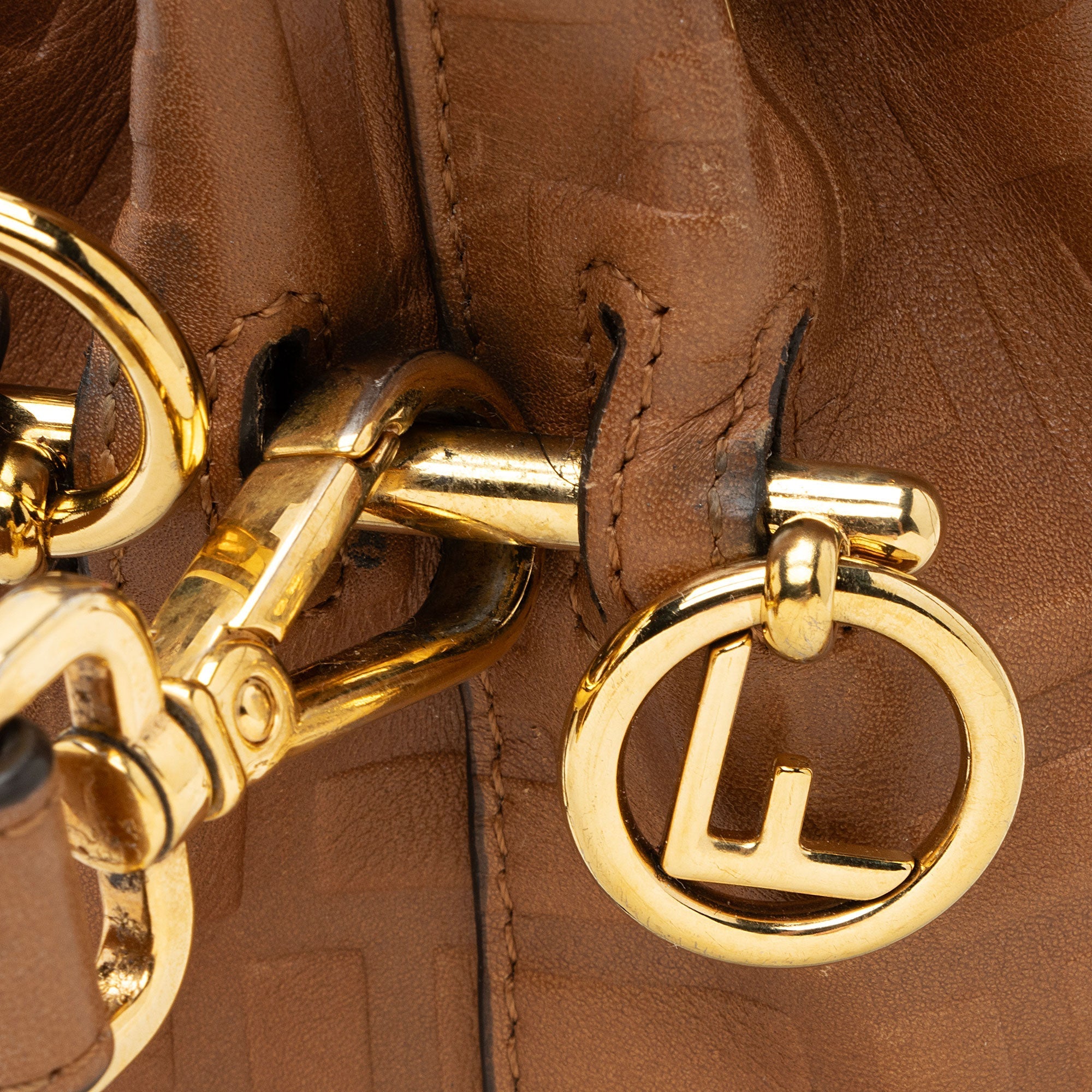 Fendi FF Embossed Calfskin Mon Tresor Mini Bucket Bag (SHF-E3Olct)