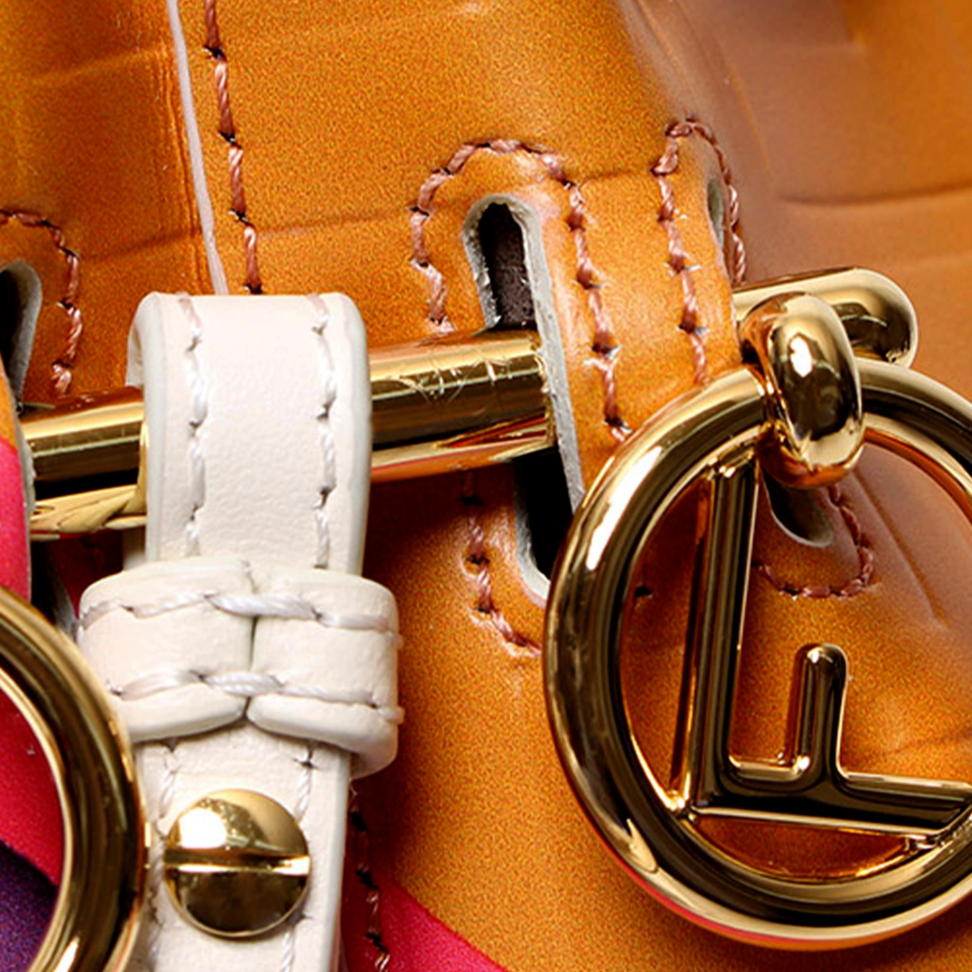 Fendi FF Embossed Striped Mini Mon Tresor Bucket Bag (SHG-ryQxMo)
