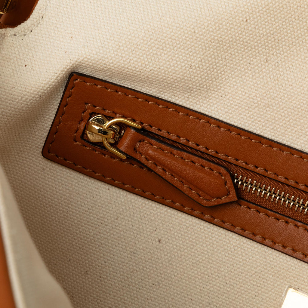 Fendi Medium Embossed Canvas FF Baguette (SHG-K9Z8RL)