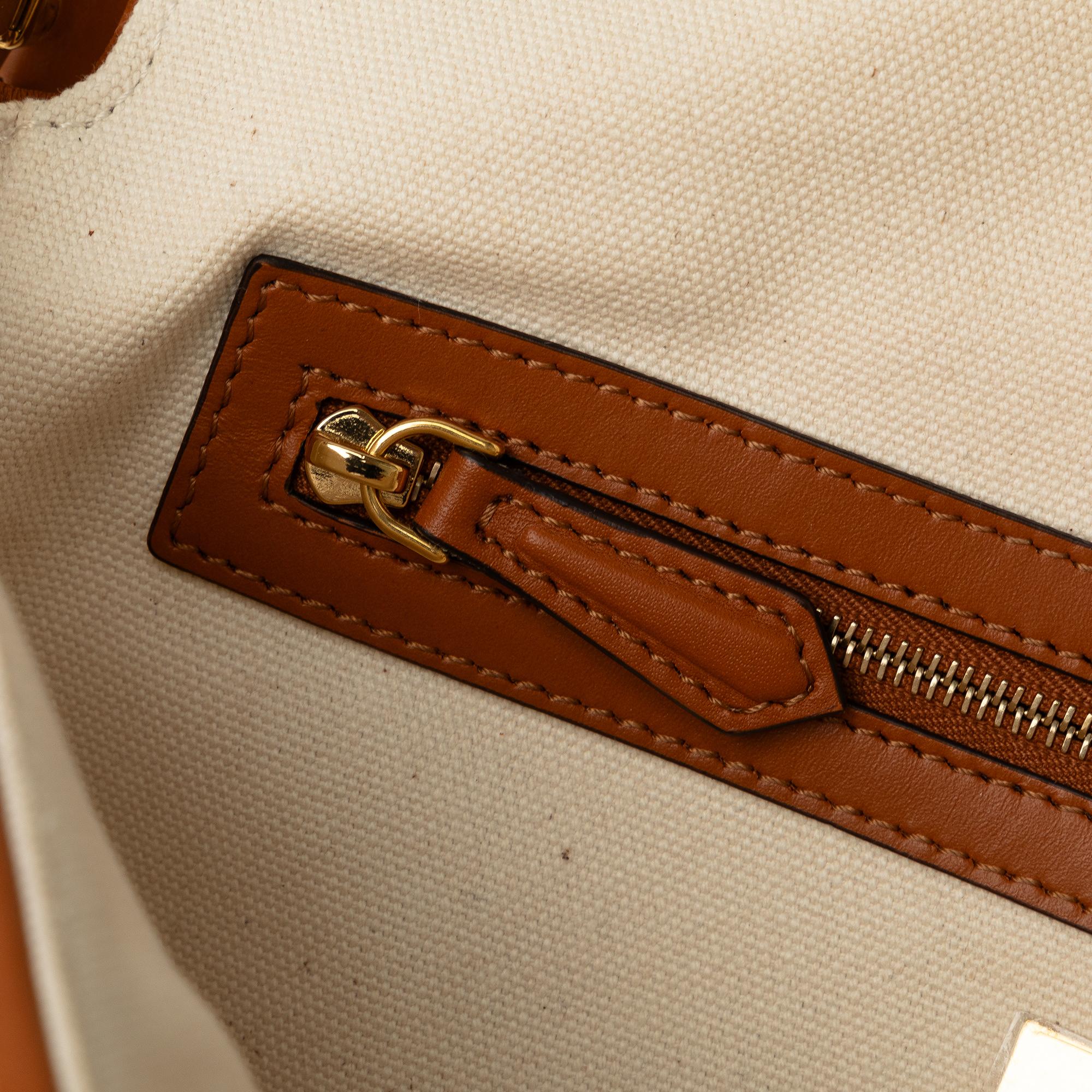 Fendi Medium Embossed Canvas FF Baguette (SHG-K9Z8RL)