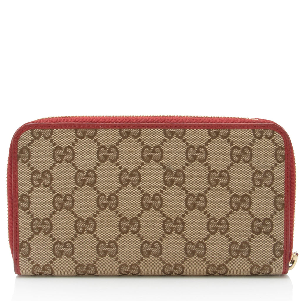Gucci GG Canvas Zip Around Wallet (SHF-pjF8AV)