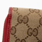 Gucci GG Canvas Zip Around Wallet (SHF-pjF8AV)