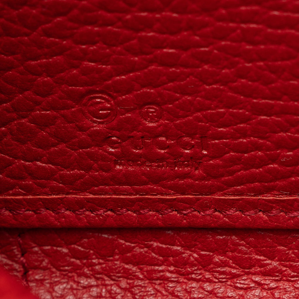 Gucci GG Canvas Zip Around Wallet (SHF-pjF8AV)