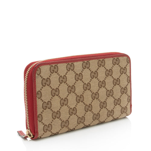 Gucci GG Canvas Zip Around Wallet (SHF-pjF8AV)