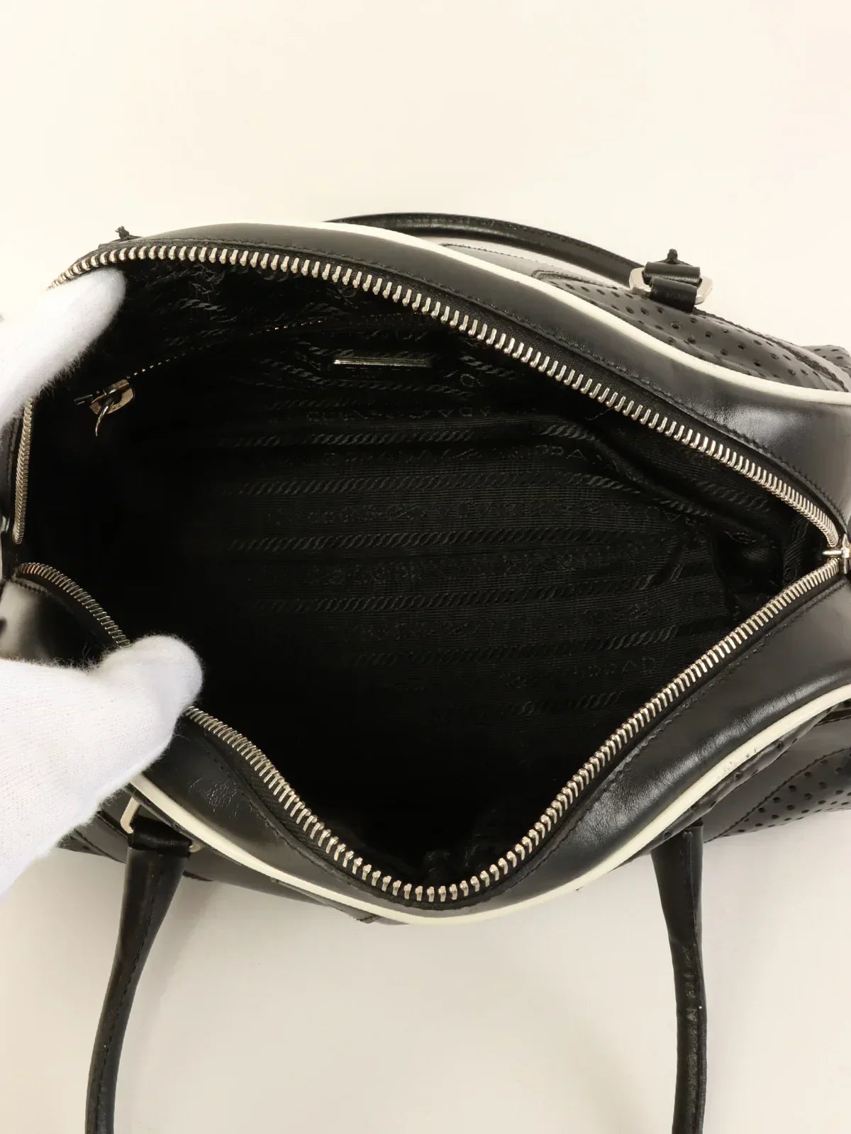 PRADA Punching Leather Logo Embossed Top Handle Bag Black