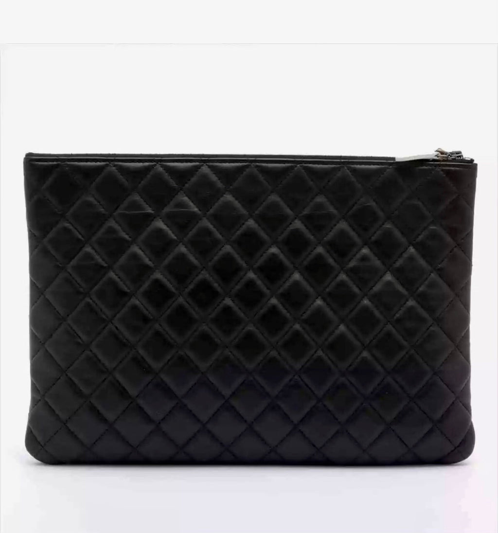 CHANEL Quilted Lambskin Large O-Case Pouch