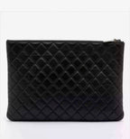 CHANEL Quilted Lambskin Large O-Case Pouch