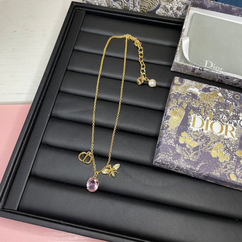 DIOR GOLD-COLORED METAL WITH WHITE RESIN PEARL NECKLACE