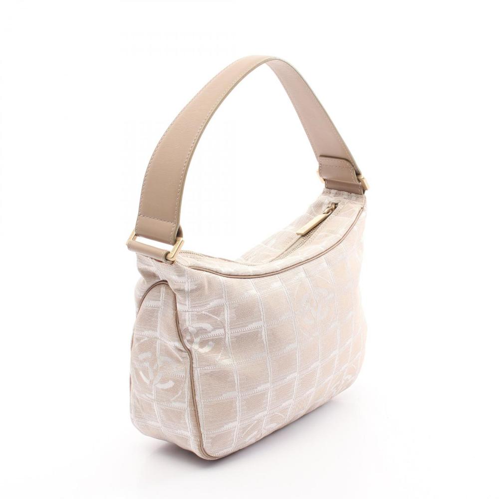 Beige Leather Chanel Travel Line