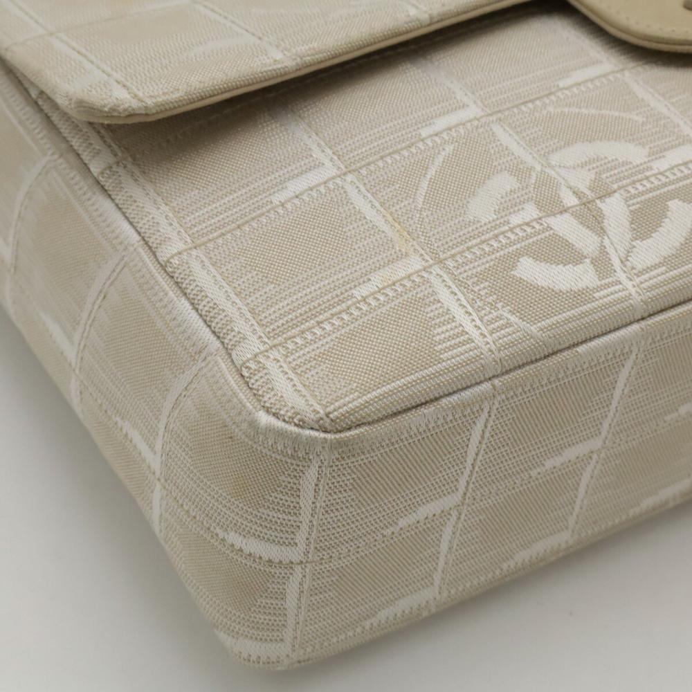 Beige Leather Chanel Travel Line