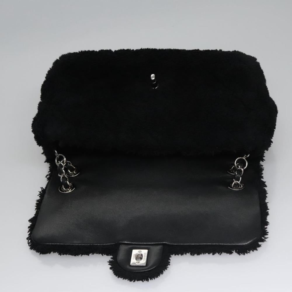 Black Canvas Chanel Flap Bag