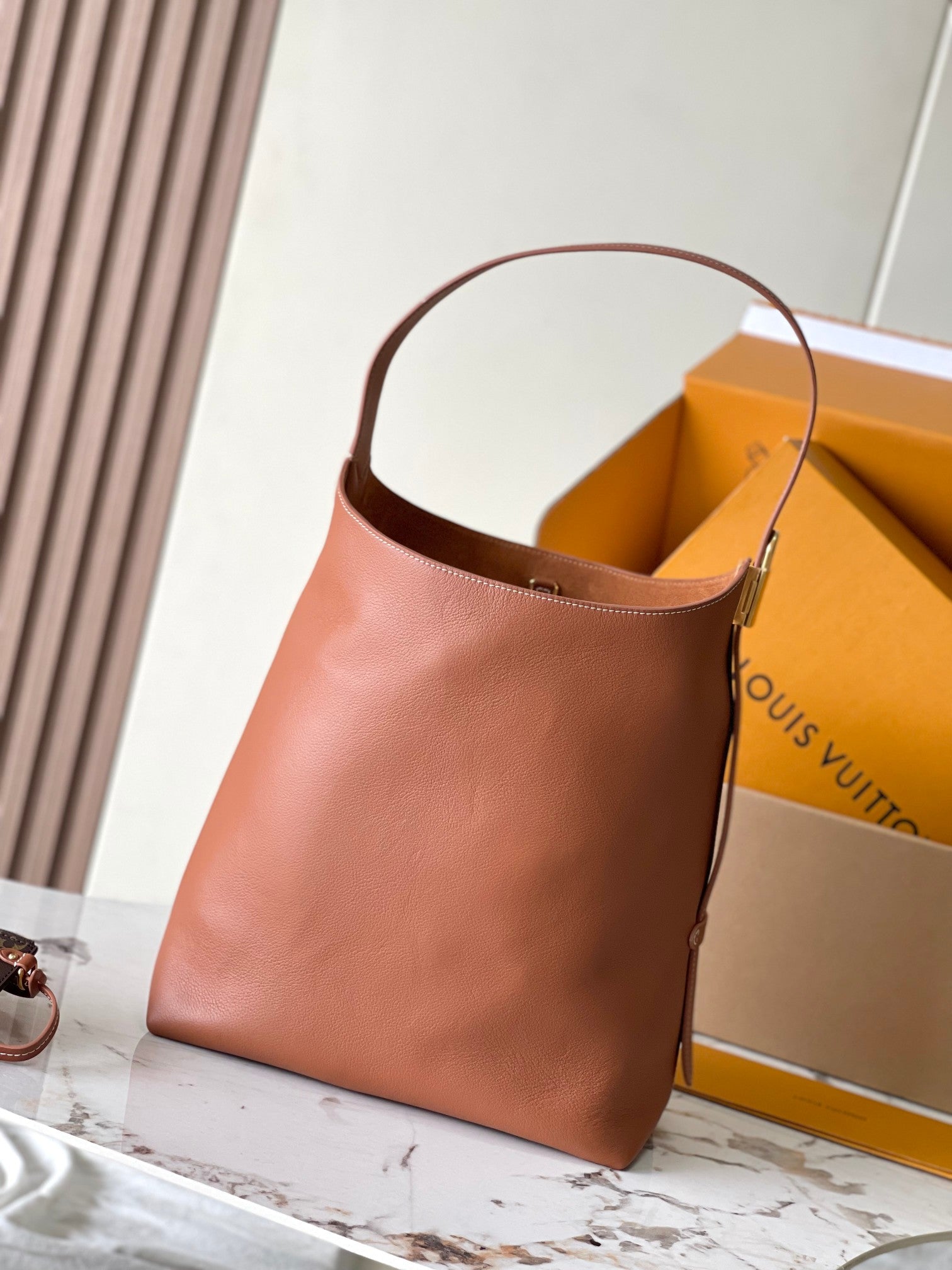 Louis Vuitton LOW KEY HOBO MM 35 IN COGNAC SMOOTH CALFSKIN