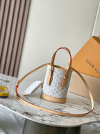 Louis Vuitton NANO BUCKET 17 IN WHITE MONOGRAM JACQUARD AND BEIGE CALFSKIN TRIM
