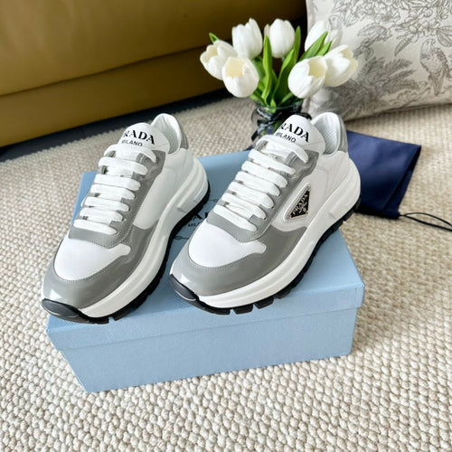 PRADA BLACK THICK SOLE SNEAKER GRAY AND WHITE CALFSKIN