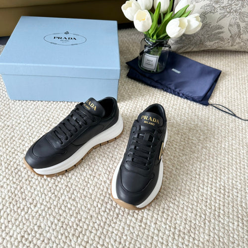 PRADA THICK SOLE SNEAKER BLACK CALFSKIN