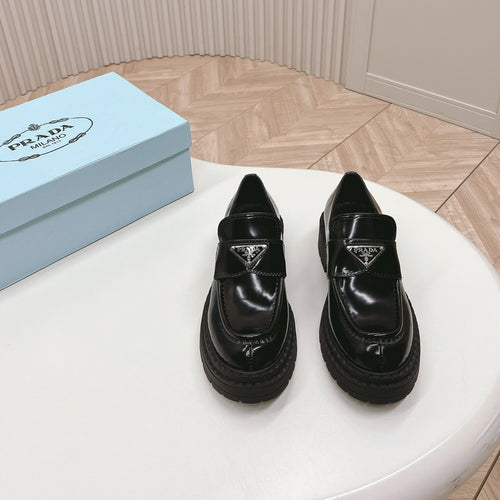 PRADA BRUSHED MONOLITH LOAFERS GLOSSY BLACK CALFSKIN