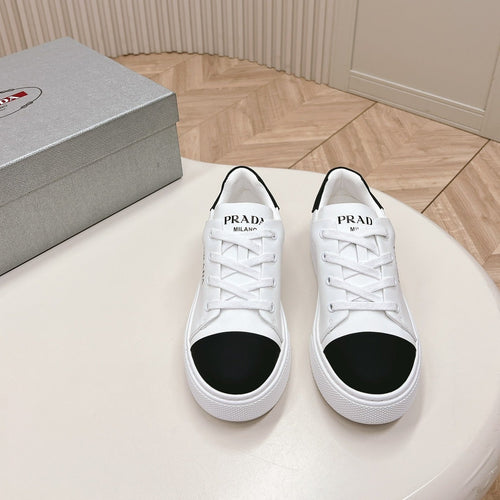 PRADA LOGO OUTLET BASIC SNEAKERS WHITE AND BLACK TOE CALFSKIN