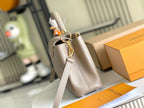 Louis Vuitton CAPUCINES BB 27 BEIGE TAURILLON GOLD HARDWARE
