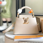 Louis Vuitton CAPUCINES MINI 21 BEIGE TAURILLON GOLD HARDWARE