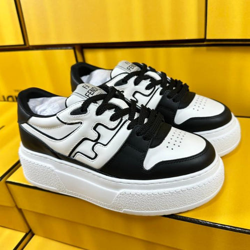 FENDI FENDI THICK-SOLDED SNEAKER IN WHITE AND BLACK LAMBSKIN
