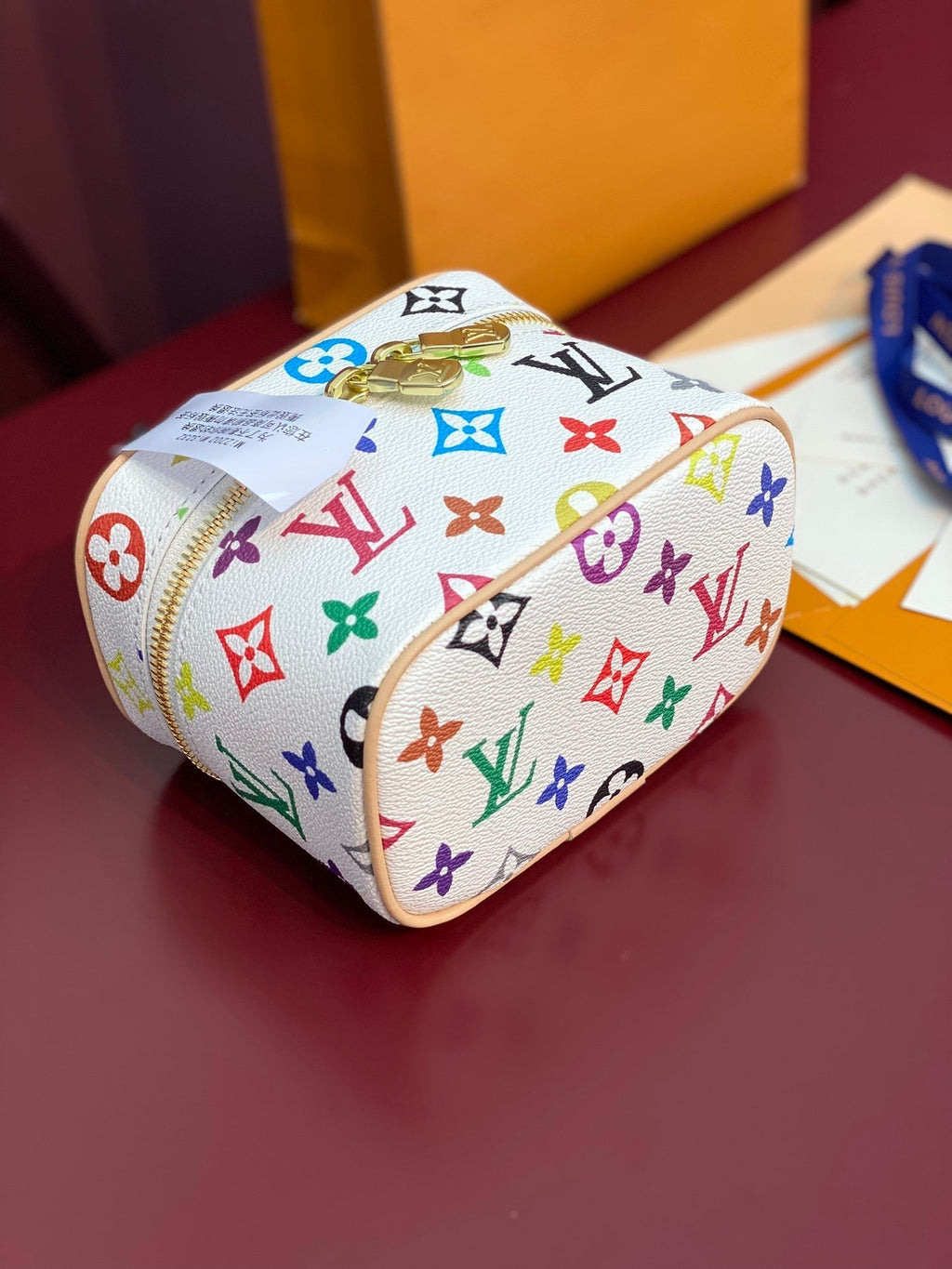 Louis Vuitton NICE NANO 14 IN MULTICOLOR MONOGRAM CANVAS GOLD ZIPPER