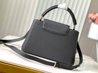 Louis Vuitton capucines mm 31.5 black taurillon leather gold hardware
