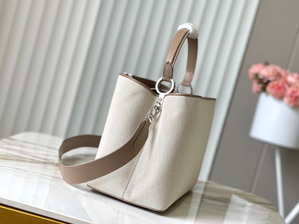Louis Vuitton CAPUCINES SOUPLE GM 38 IN WHITE CANVAS AND TAUPE CALFSKIN TRIM