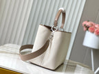 Louis Vuitton CAPUCINES SOUPLE GM 38 IN WHITE CANVAS AND TAUPE CALFSKIN TRIM