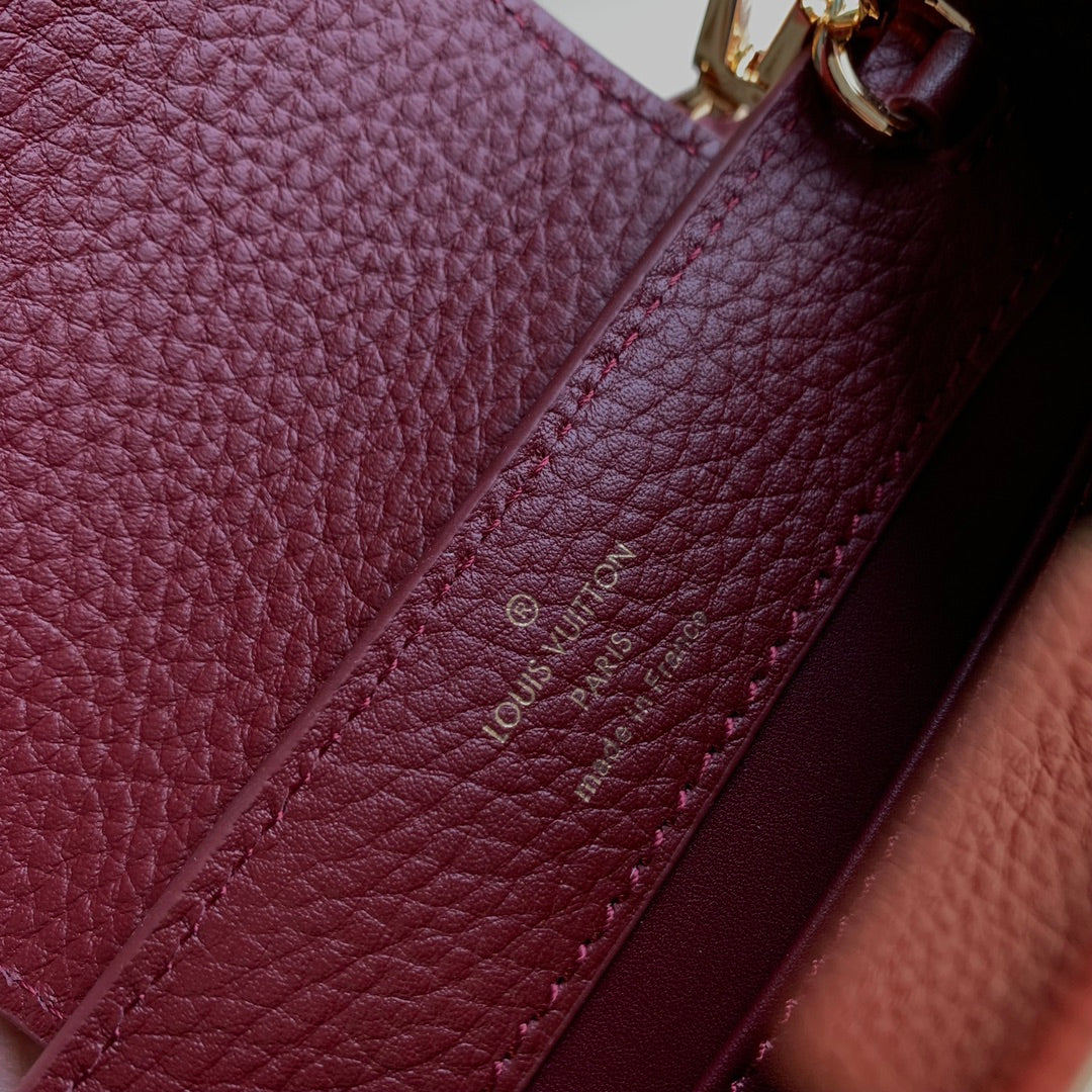Louis Vuitton CAPUCINES MINI 21 BURGUNDY TAURILLON GOLD HARDWARE