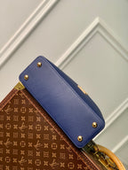 Louis Vuitton capucines mm 31.5 dark blue taurillon leather gold hardware