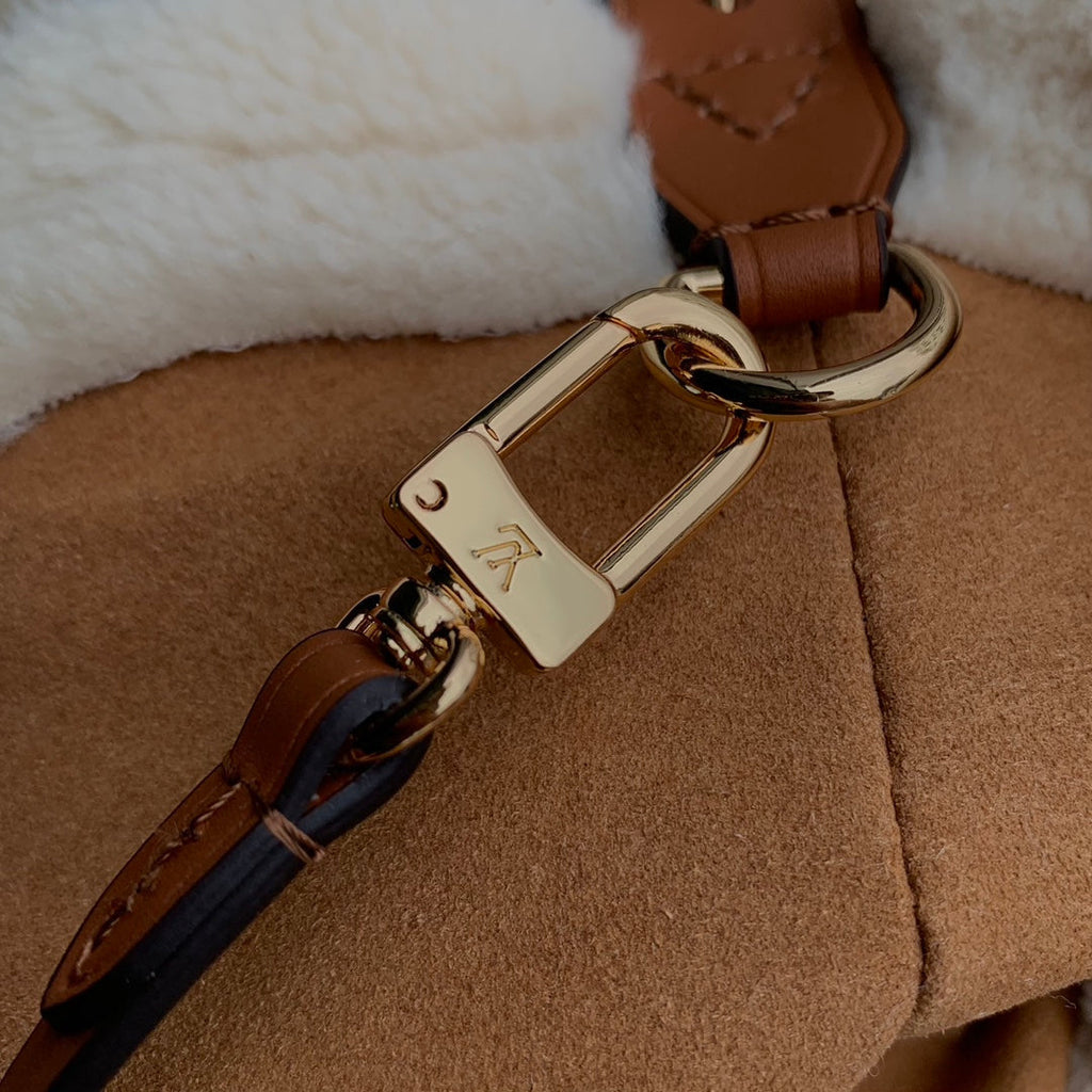 Louis Vuitton CARRYALL PM 29 IN CIDER BROWN MONOGRAM PERFORATED SUEDE AND WHITE SHEARLING TRIM