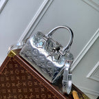 Louis Vuitton SPEEDY BANDOULIÈRE 20 IN SILVER MONOGRAM EMBOSSED CALFSKIN