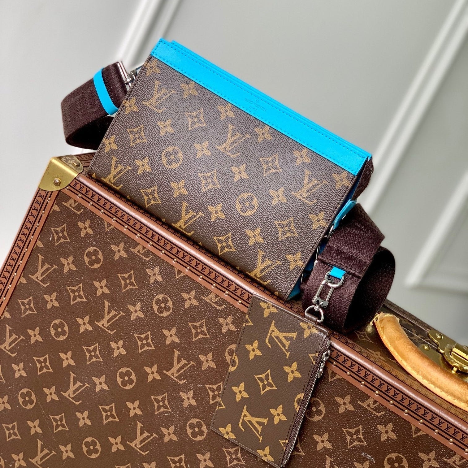 Louis Vuitton GASTON WEARABLE WALLET 18 IN BROWN MONOGRAM CANVAS MIX SKY CALFSKIN