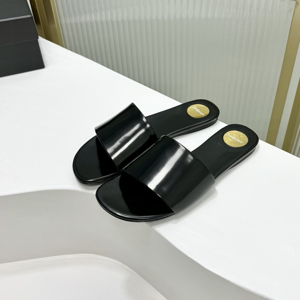 Saint Laurent CARLYLE SLIDES IN BLACK GLAZED LEATHER